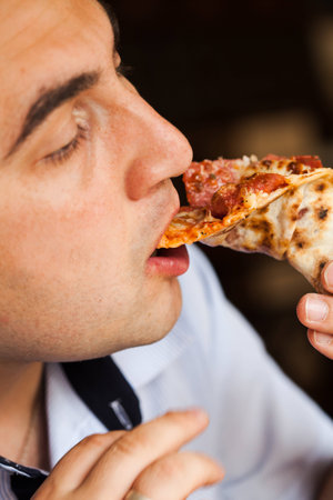 Eat pizzaの写真素材