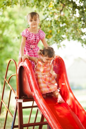 girls on the slideの写真素材