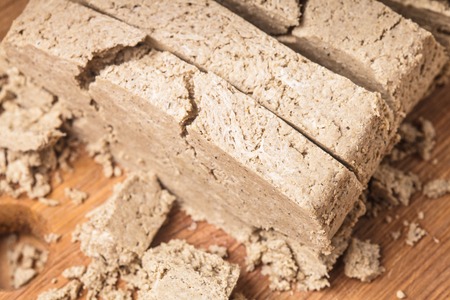 Sweet food - halva colse up on the boardの写真素材