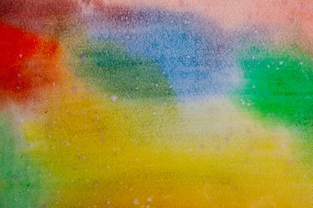 Painted watercolor rainbow background for a designの写真素材