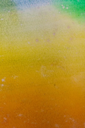 Painted watercolor rainbow background for a designの写真素材