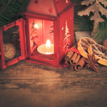 Red christmas candlestick and flavours of holidaysの写真素材