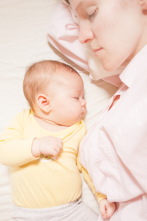 co-sleeping mother and babyの写真素材