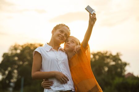 happy girl Friends taking selfie