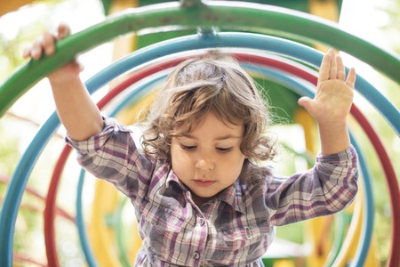 Girl play in playgroundの写真素材