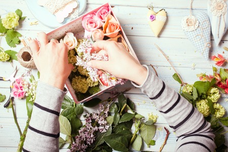 Box with flowers and macaroonsの写真素材