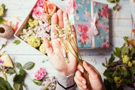 hand with flowersの写真素材