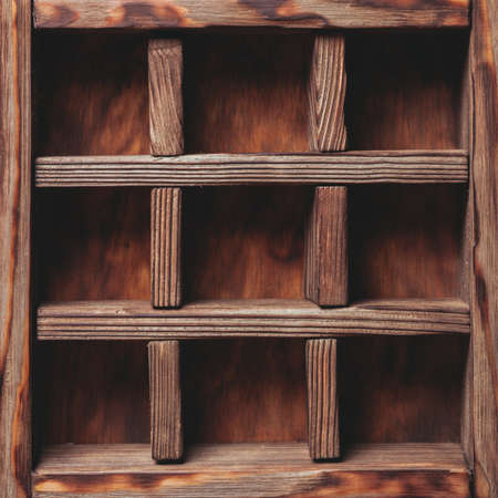 Vintage shelf stand on the wooden background