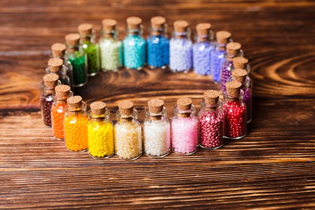 Beads in the vintage mini glass bottles