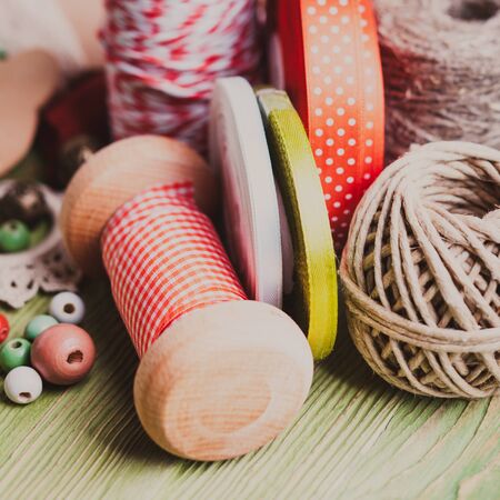 Holiday rope and ribbon decorations for craft paper gift box