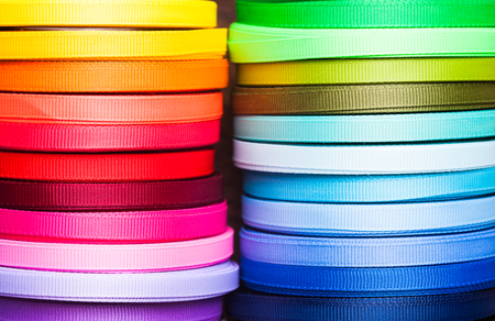 The various colors ribbon bobbins close upの写真素材