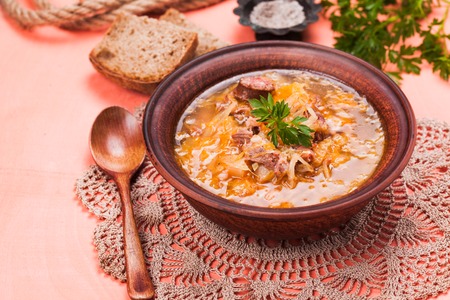 Gombaleves - Chrismtas hungarian soup with sauerkraut, sausages, mushrooms and barleyの写真素材
