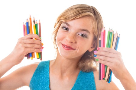 Color rainbow pencils and teenager hands with multicoloured nailsの写真素材