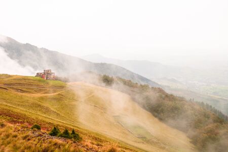 Empty collapsed house far away in the mountains