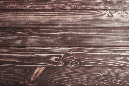 Old wooden wall, brown painted, outdoor weathered
