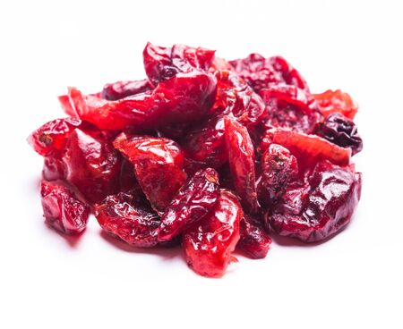 The pile of dried cranberries isolated on white