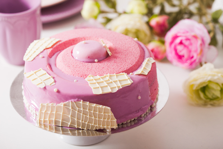 French vanilla cake wtih srawberry compote, pistachio mousse and crunchy layerの写真素材