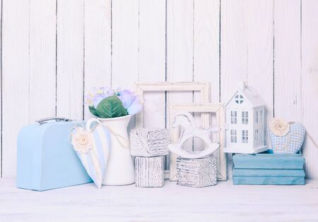 Small toy house, pony,  bricks in the children's room on wooden backgroundの写真素材