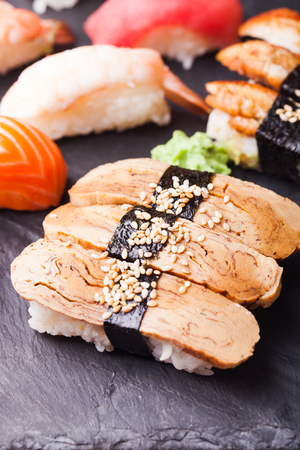 Close-up of Tamago sushi with omelet and wasabiの写真素材