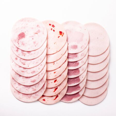 Meat delicatessen rows isolated on white backgroundの写真素材