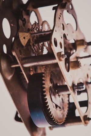 The internal design of the mechanical and rusty clock in a larger view