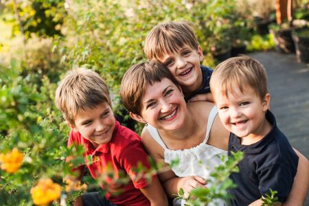 Family in garden shopの写真素材