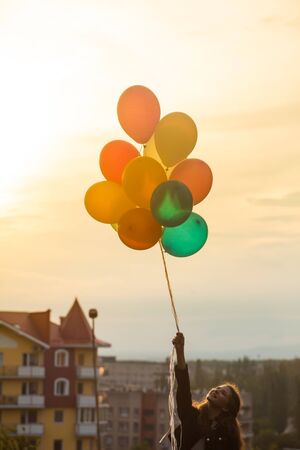 Girl with colorful balloonsの写真素材
