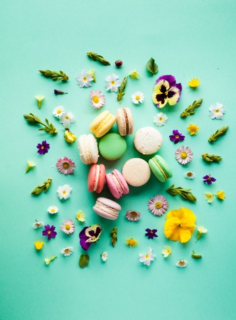 Colorful macaroons and flowersの写真素材