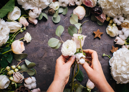 Florist makes a bouquetの写真素材