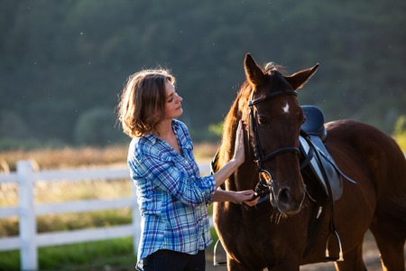 Beautiful girl with horseの写真素材