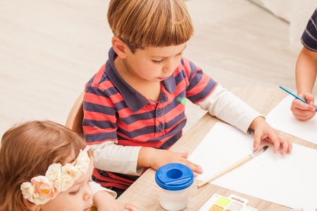 Children are paintingの写真素材