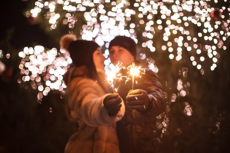 Couple with sparklersの写真素材