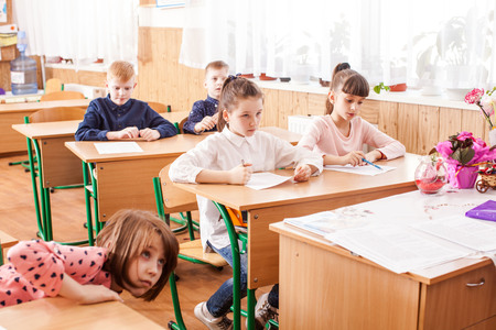 Children taking an exam