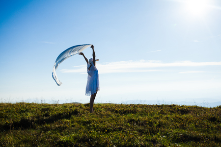 Unity of the girl with natureの写真素材
