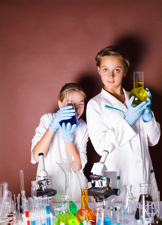 Two pupils at chemistry lessonの写真素材