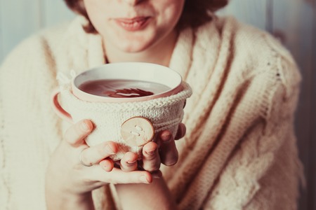 Woman with cup of teaの写真素材