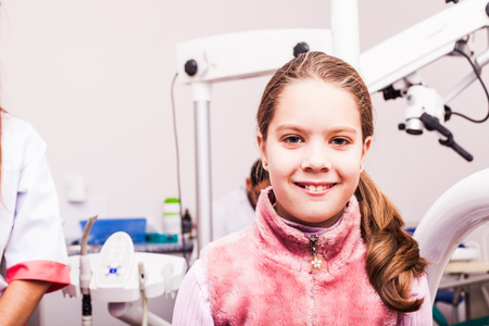 Teenager at the dental clinicの写真素材