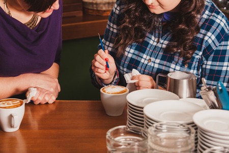 Latte art on the cupの写真素材