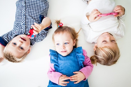 The children are posing isolatedの写真素材