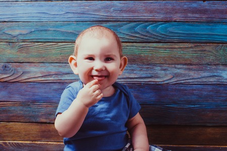 Child with finger in mouth