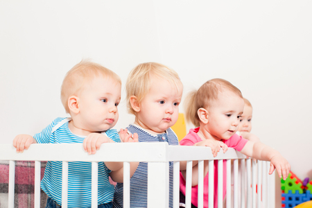 Babies in the cribの写真素材