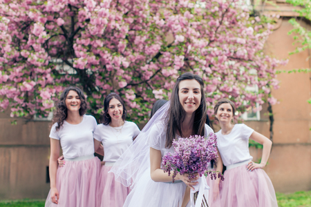 Bride-to-be holding flowers