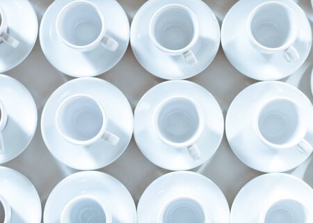 Simple pattern made of empty cups of coffeeの写真素材