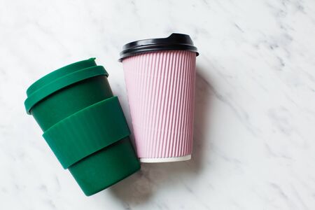 Paper coffee cup and bamboo reusable drink mugの写真素材