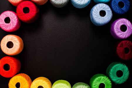 All colors yarn for knitting in the borders with place for text