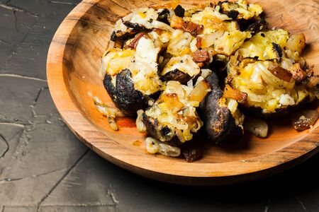 Baked Potatoe filled with bacon and fried onion,の写真素材