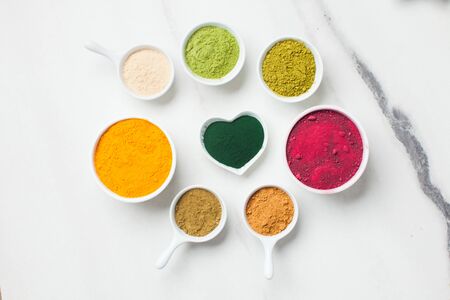 Superfood smoothie boosters, various dietary supplements in bowlsの写真素材