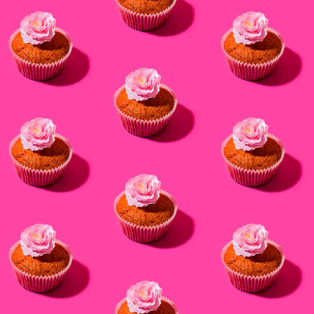 Stylized image of a cupcake and sakura flower as a patternの写真素材