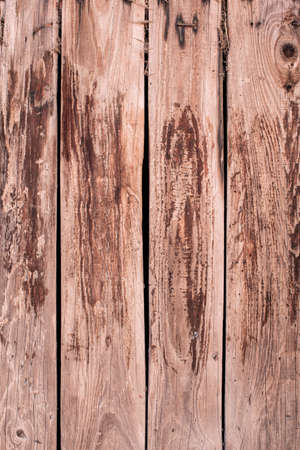 Closeup old and weathered wooden wall or table surface. Weathered wooden planks, wallpaper mockup,...