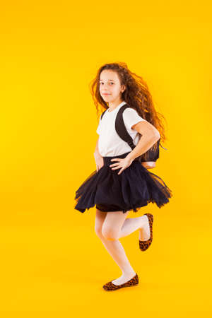 The schoolgirl looking forward to the start of schoolの写真素材